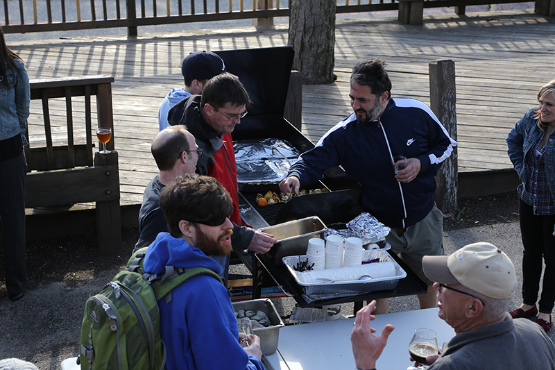 Ted Miller (red jacket) at the grill