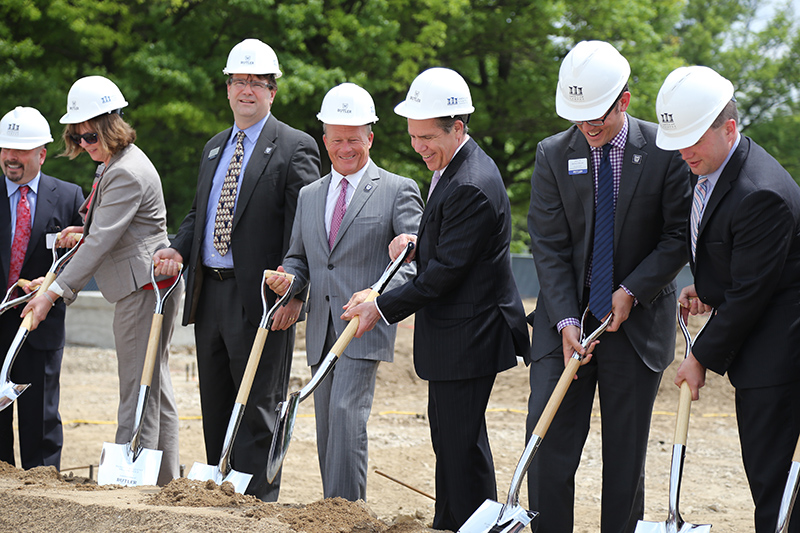Keith Burks, Chairman of the Butler Board of Trustees (center), and James Danko, President of Butler University (third from right) at the groundbreaking.