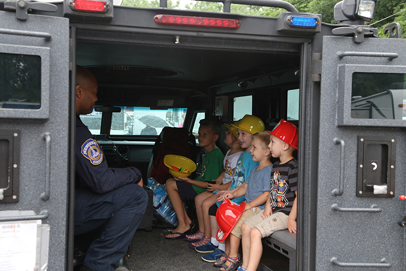 The Gazette witnessed five hardened criminals being briefed in the IMPD SWAT vehicle before being taken downtown for booking. No, wait, it is just Touch a Truck day!
