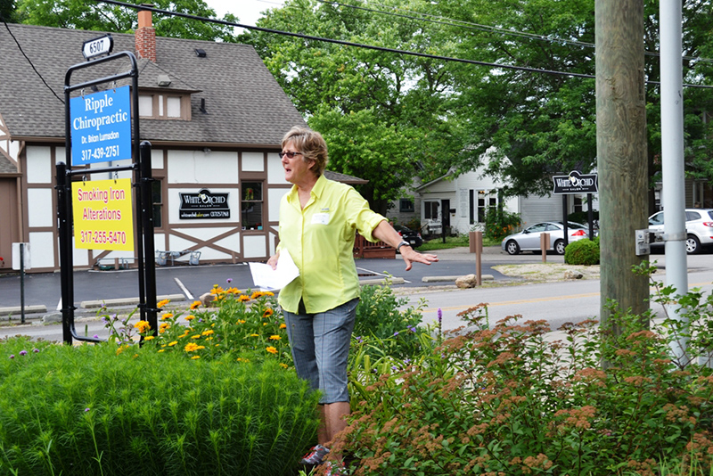 Nancy Hill of the Brewpub describing the gardens