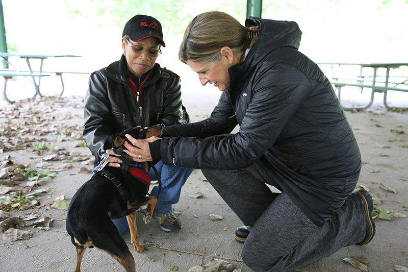 The Rev. Barbara Kempf blesses Rex