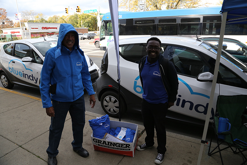 BlueIndy had cars on display and offered free test drives and t-shirts.