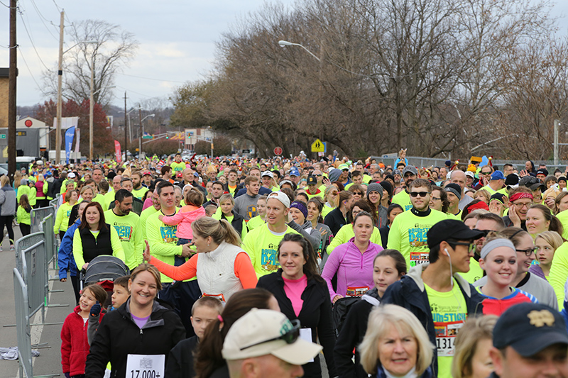 Looking west 20 minutes after the start of the race, there are still participants as far as you can see approaching the start line! It was about this time when the first runner hit the finish line.