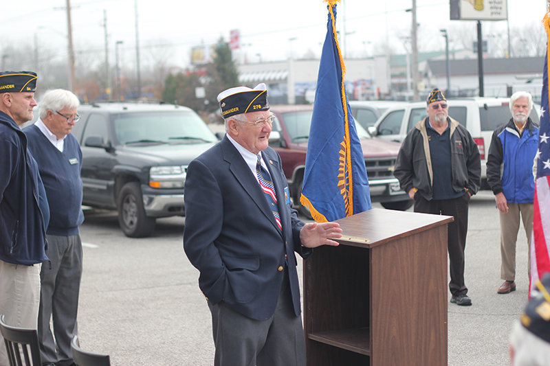 Ron Collins, American Legion 11th District Commander, addresses the crowd at the grand opening of the new Post #34.