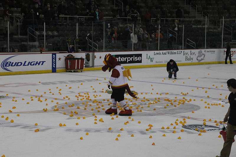 Indy Fuel mascot Nitro skates through the hundreds of Broad Ripple rubber ducks as they continue to fly in from the stands.