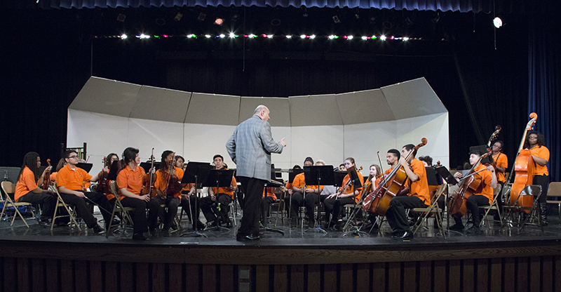 Colonel Lowell Graham, former commander of the USAF band, ran a clinic for the BRMHS advanced orchestra of Leslie Bartolowits.