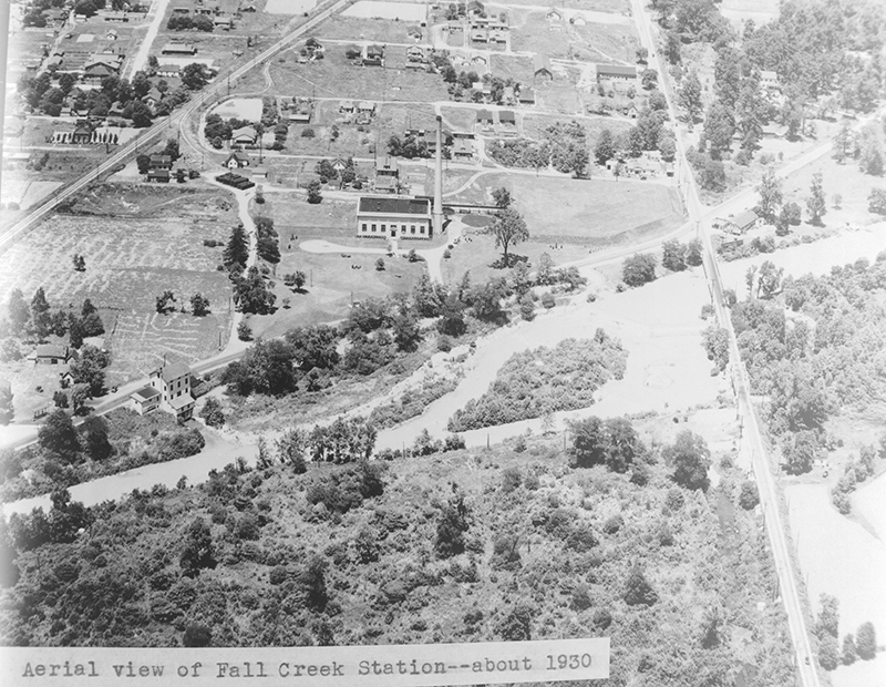 An aerial from around 1930 of the Fall Creek treatment plant (center) and the old mill (lower left). Keystone runs down the right side of the image. Fall Creek is at the bottom. The Nickel Plate RR tracks run diagonally in the upper left.