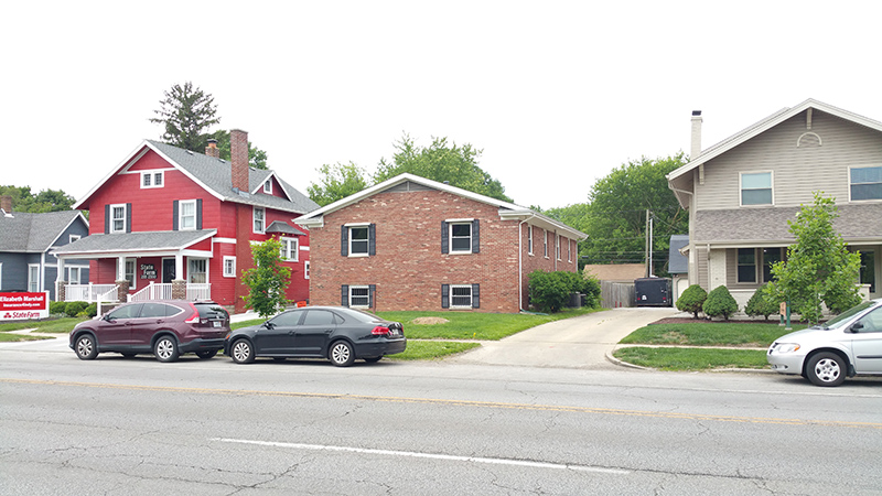 The brick office building at 6128 College Avenue. (Agenda item B)