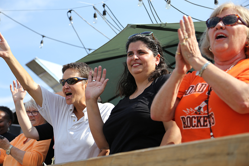 Parents and teachers watching from the deck at Triton Tap