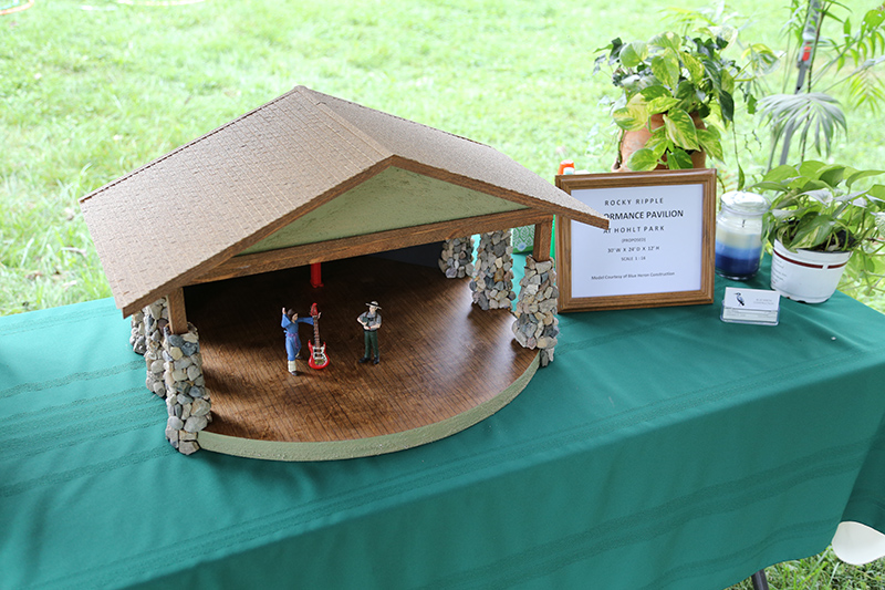 Blue Heron Construction prepared a model of a proposed permanent music shelter for Hohlt Park. The music is currently held in a tent. The project is being funded by donations and free labor.
