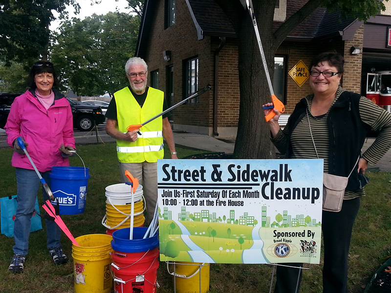 Cleanup organizer for Broad Ripple Kiwanis Helen Carroll (right) with Jenny Moehring and Julio Tierno