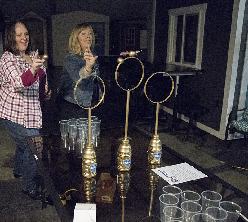 Tammy Lieber and Laura Dodds play Quidditch Pong.