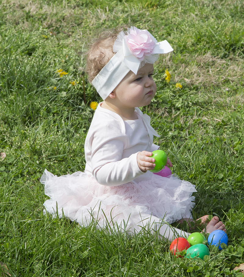 Wetherill Fallon in her Easter best, surrounded by her finds.