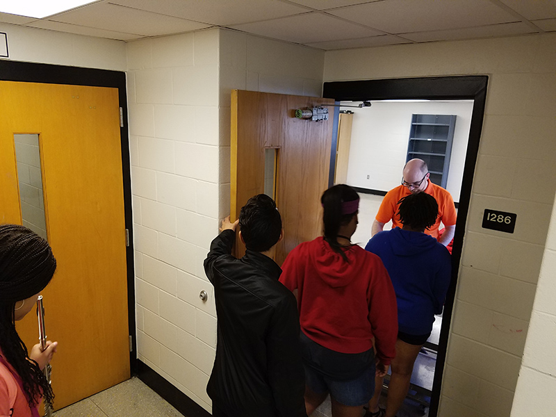 handing out t-shirts