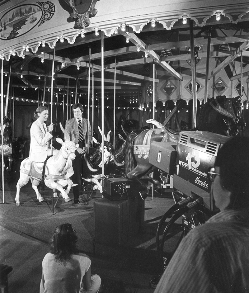 Indianapolis's own Jane Pauley and David Letterman ride the carousel during a Channel 13 taping.