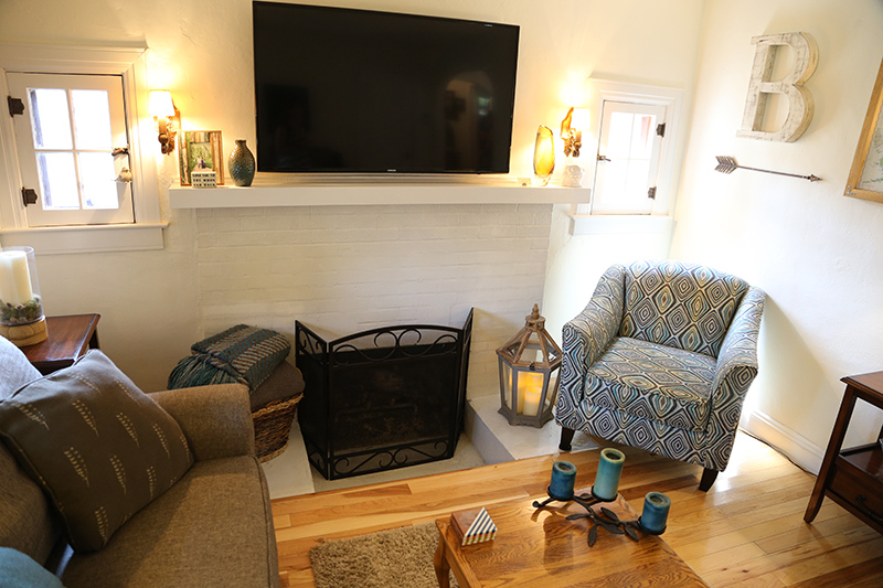 An interesting sunken fireplace in the living room of 5920 Ralston Avenue