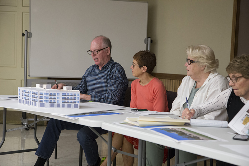 The committee looks at the model of the building proposed for 1430 Broad Ripple Ave.