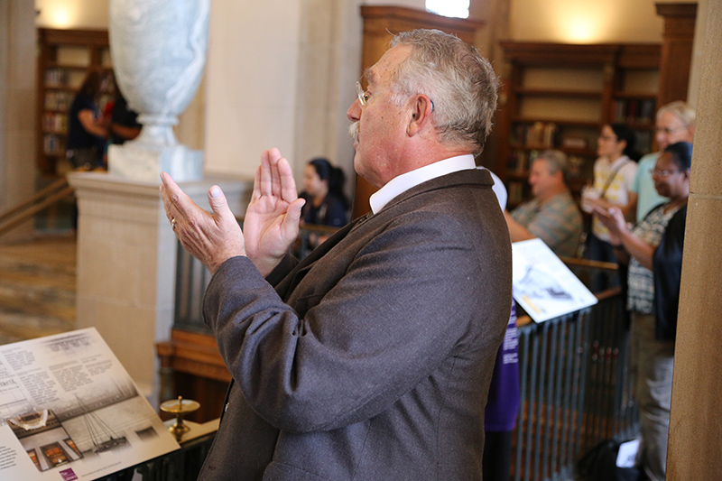 Teddy Roosevelt applauds