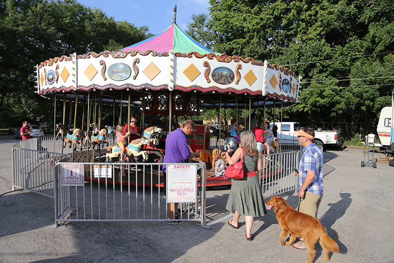 There was a midway with fair food, games, and kiddie rides, including a carousel and a ferris wheel.