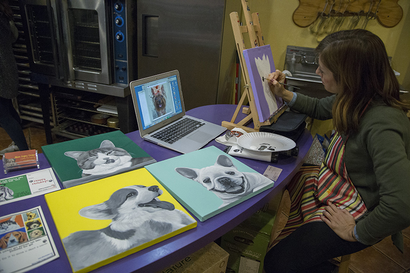 Allison Kegley painting pet pictures at Three Dog Bakery, 844 Broad Ripple Avenue