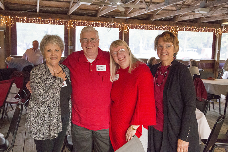 Christine Carlson ('66), Charlie Waite, Karen Piotroski Briskey ('66), and Susanne Powers Keeton ('66) at the White River Yacht Club reunion for the Class of 1966.