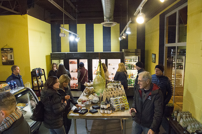 Browsing the holiday food ideas at Nicole-Taylor Pasta Market, 1134 E. 54th Street Studio C