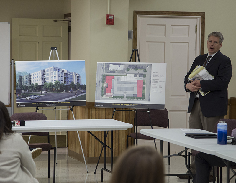 Tim Ochs presents the redesigned Buckingham Properties building proposed for the south half of the 6200 block of College/Carrollton. One change is the addition of a retail element along Carrollton (shown in pink.)