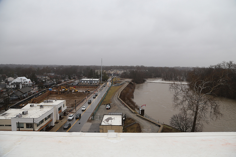 A view from the rooftop deck looking north at Westfield Boulevard and the Broad Ripple dam on White River.