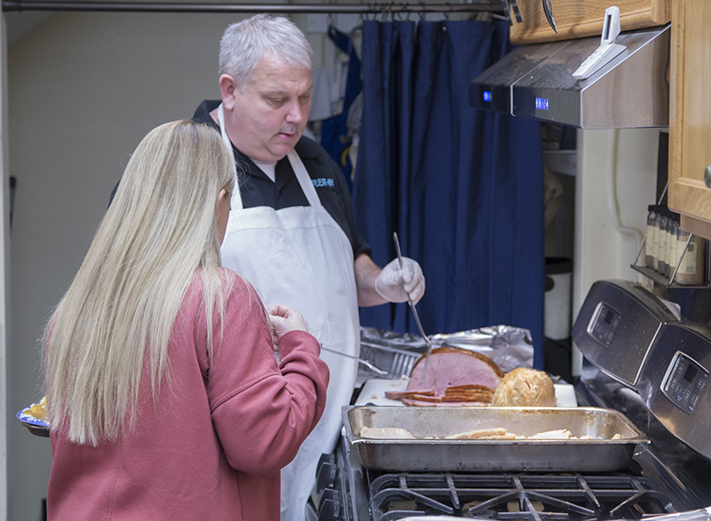 Carving the ham and turkey