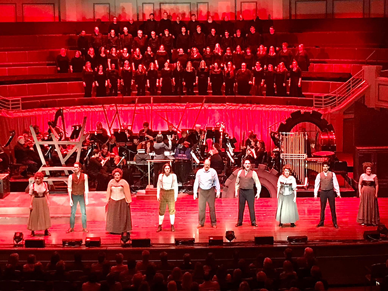 The cast, CSO and choir