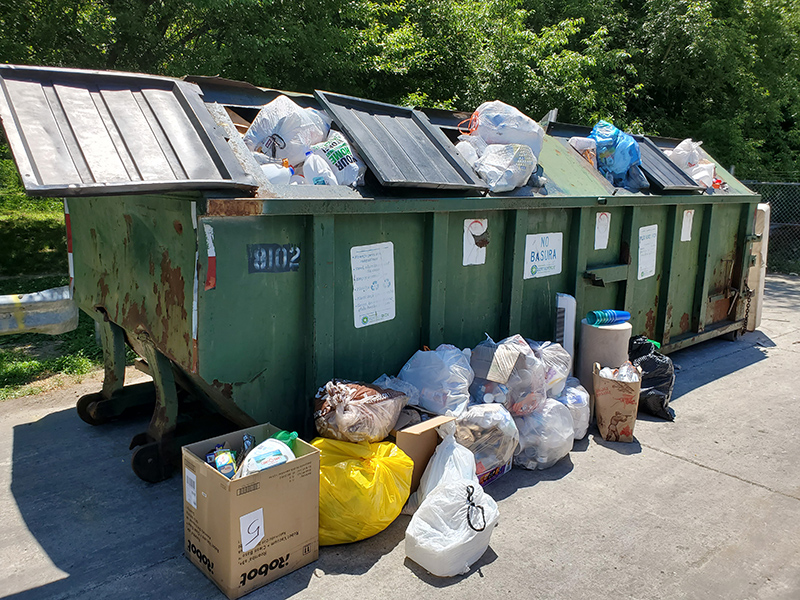 Overflowing recycling bin at Broad Ripple Park