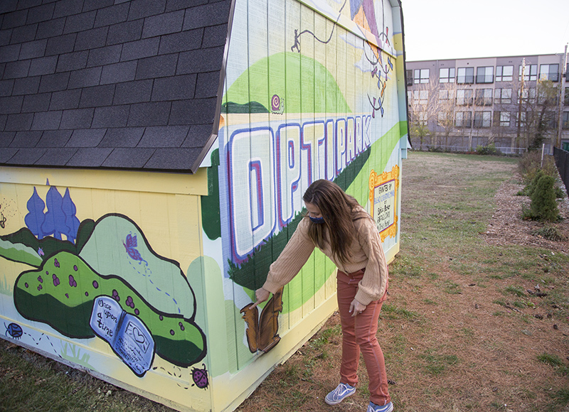 Erica pointed out the squirrel added to the mural because he would visit during the painting each day.