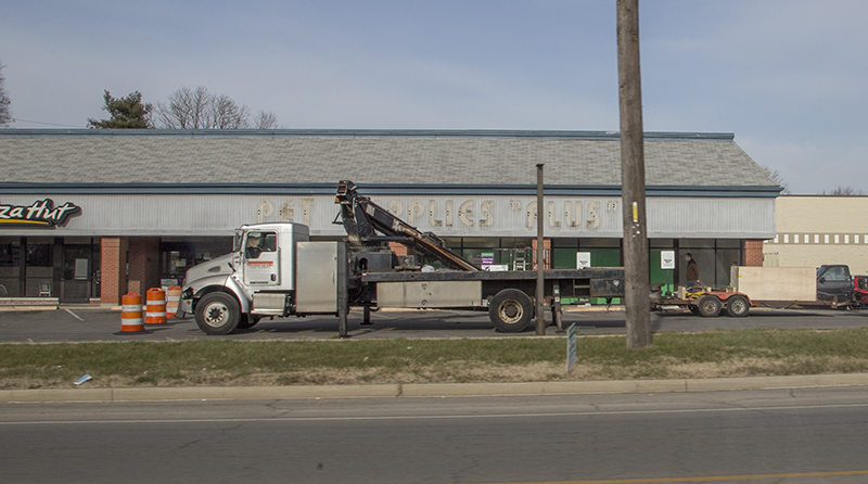 The old sign coming down