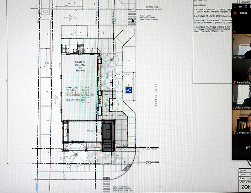 Modified site plan with continuous sidewalk and crosswalk along 65th Street