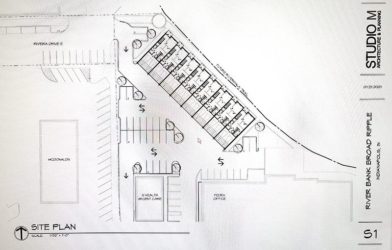 Revised site plan showing additional sidewalks