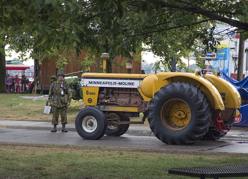 Tractors and farmers lined up for the fair parade