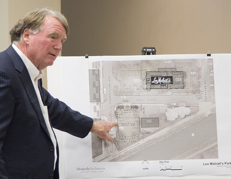 Tuohy showing the plan for the small parcel on the canal.