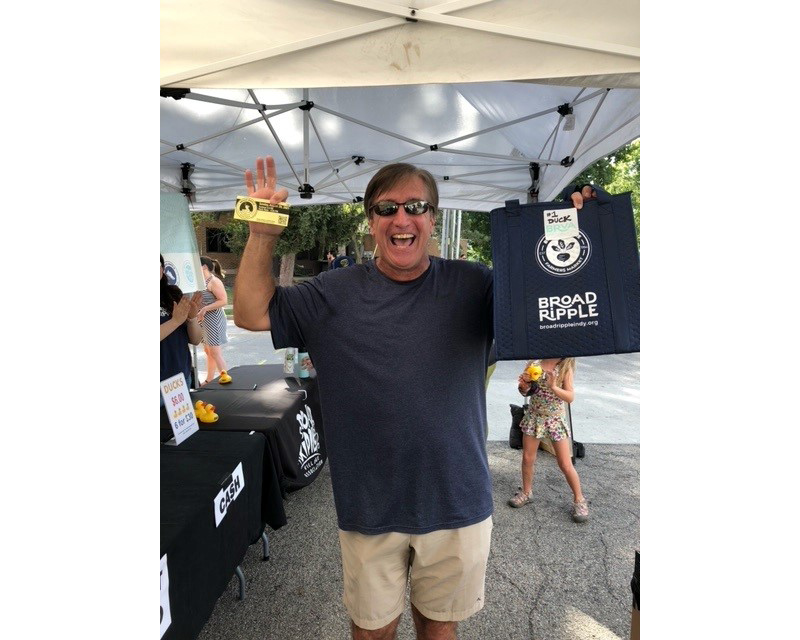 First-place winner, Steve Queisser, claiming his prizes