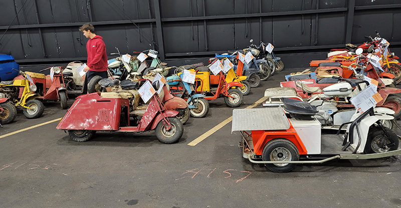 Just some of Glen Hague's Cushman scooter collection