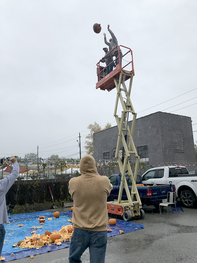 Kevin Holm of Midtown donated $100 to toss the biggest pumpkin. All the money goes to help provide STEAM programs in Midtown schools (Science Technology Engineering Art and Math)