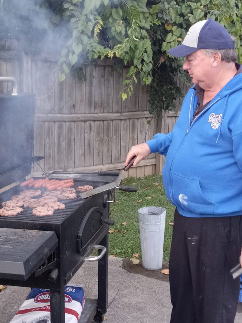 The Pawn Shop's Robert Diemer grilling burgers for the event.