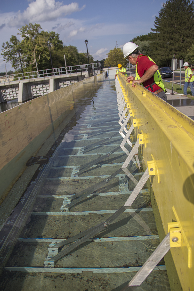Issue from Sep. 16 - Flood wall tested, moving certification forward