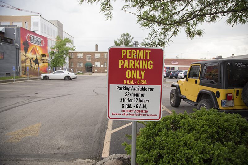 Random Rippling - Permit parking in Carrollton lot by Post Office