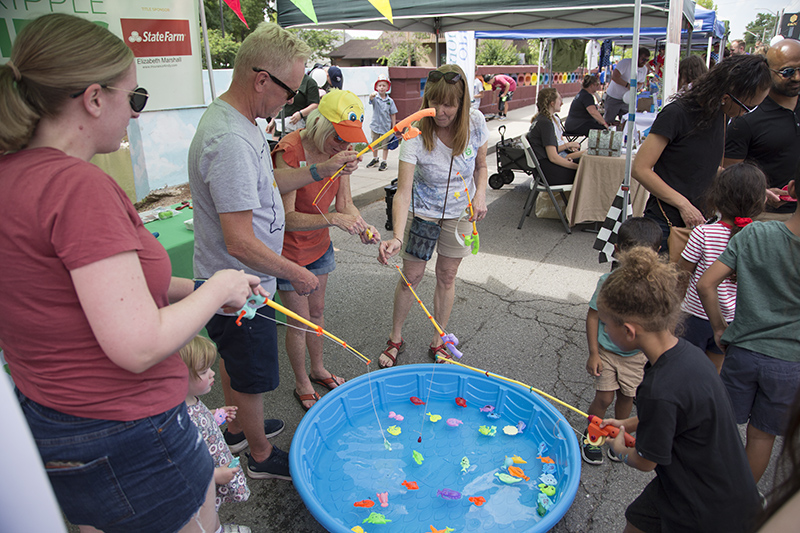 Fishing at the Broad Ripple Farmers Market tent