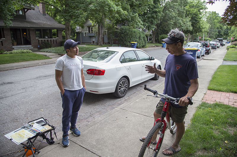 Many neighbors stopped to talk to Jingo.