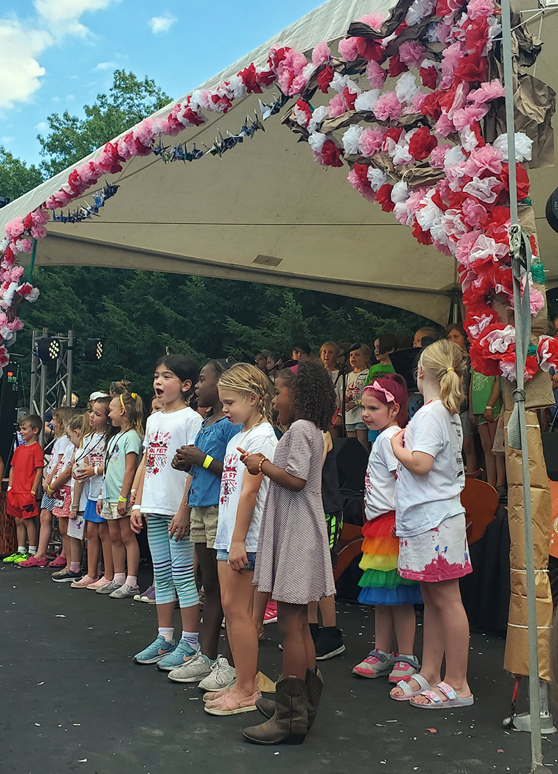1st and 2nd graders from Center for Inquiry 70 singing at the Fest