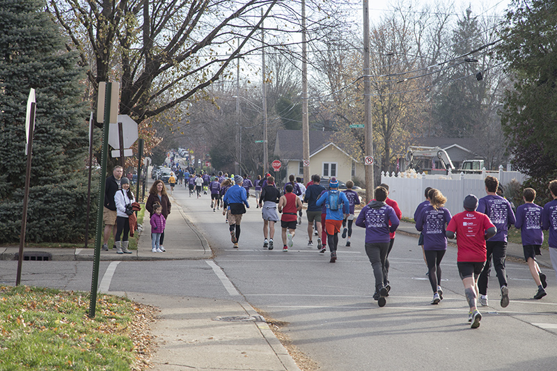 Runners heading across 61st to Compton