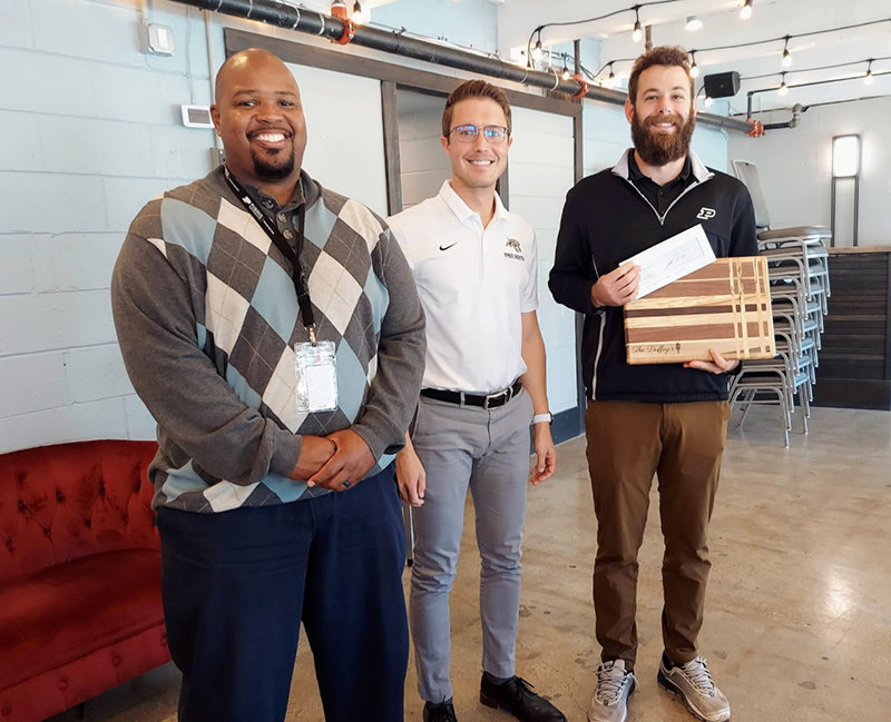 From left: Richard Benberry, principal, Humanities and Agriculture Coach Dustin Homan, and Engineering and Design Coach Will Walls