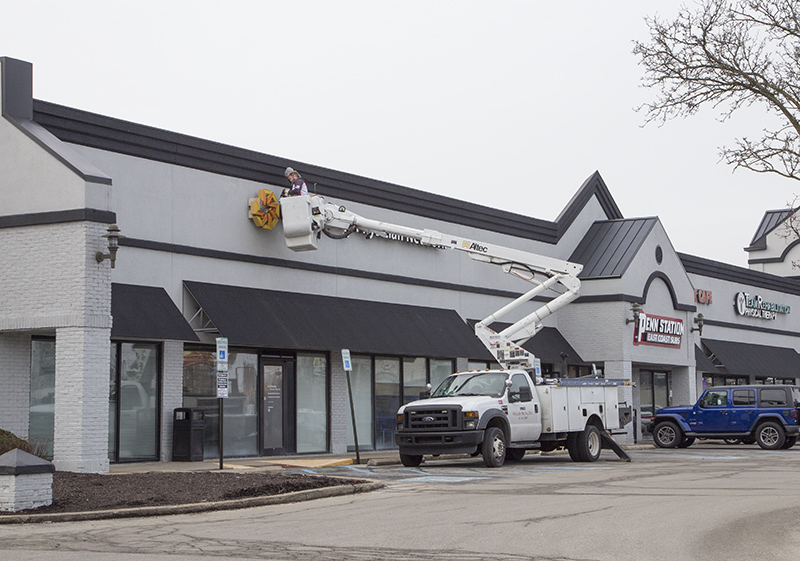 Random Rippling - Community Health sign coming down for move