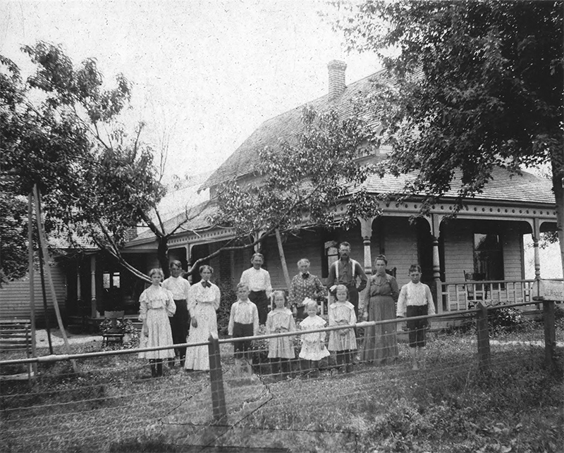 The John E. Hague family at the 96th Street house. Back row: Nitha, Glen, Aunt Nola, Uncle Dean, Grandmother Underwood, John E. Hague, Clara Hague, Girstle (your editor's grandfather). Front row: Glen, Edna (author), Mildred Hinton, Edith